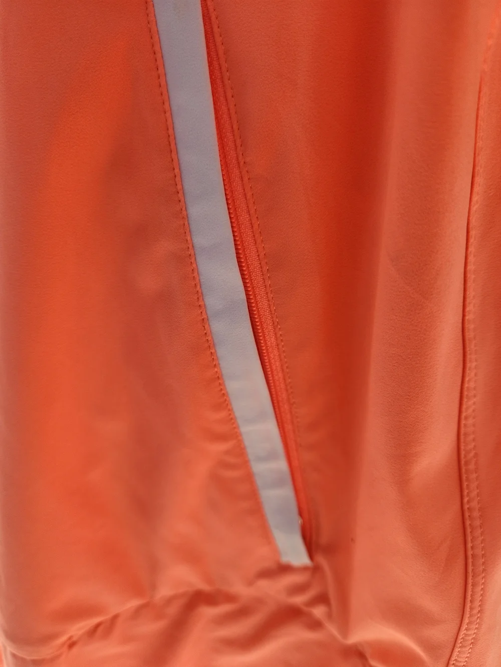 Lululemon Sun Showers Jacket in the color Watermelon Coral/White. Size 8